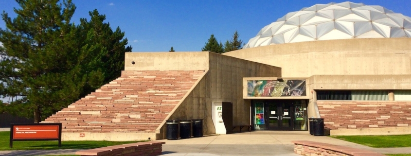 Picture of outside of Fiske auditorium. Showing a domed building and walkway